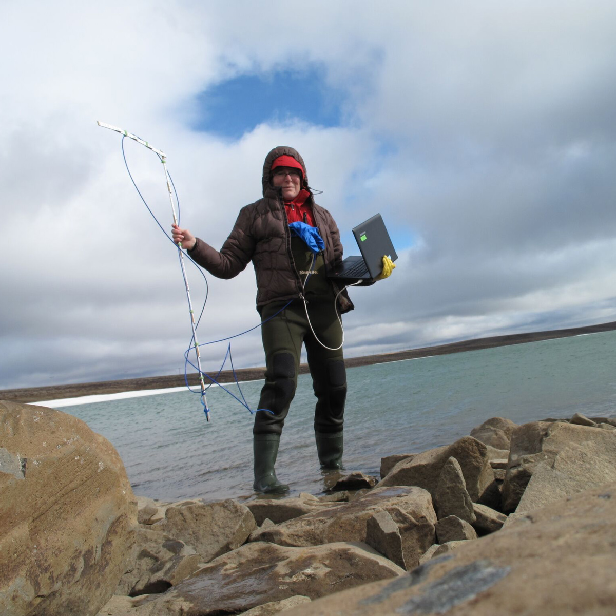 Primary Investigator Jenny Boughman preparing to record data on Ãžristikla, a glacial lake in the northern highlands. Copyright: Jenny Boughman