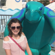 Heather Seaman standing next to turtle